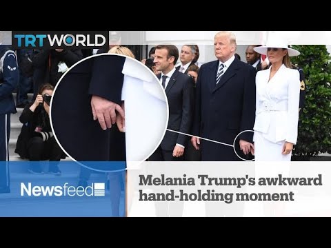 NewsFeed - Melania Trump's awkward hand-holding moment