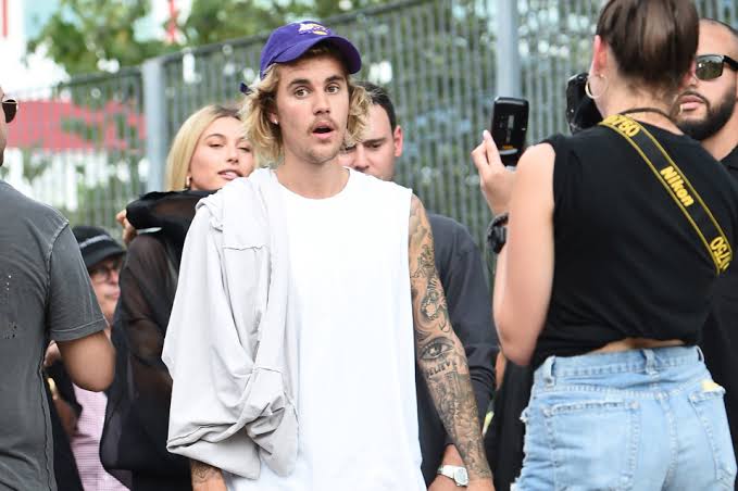 Justin Bieber wants to have a go at Tom Cruise in the ring.
