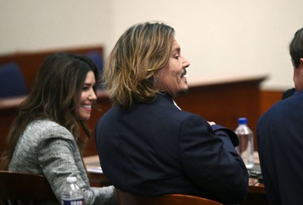 Camille Vasquez laughing with Johnny Depp