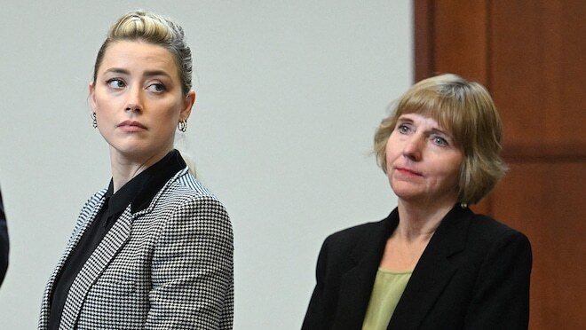 Amber Heard with her Attorney