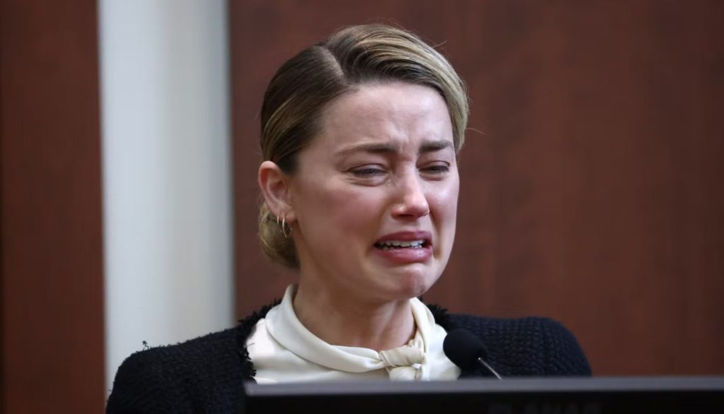 Amber Heard bursts into tears as she recalls the alleged violation by Johnny Depp