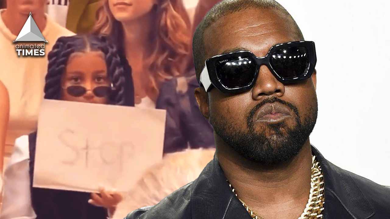 ‘Was She Asking Kanye West To Stop Making Music?’ Fans Troll Kim K’s Daughter North West After She Holds Stop Sign In Middle Of Fashion Show