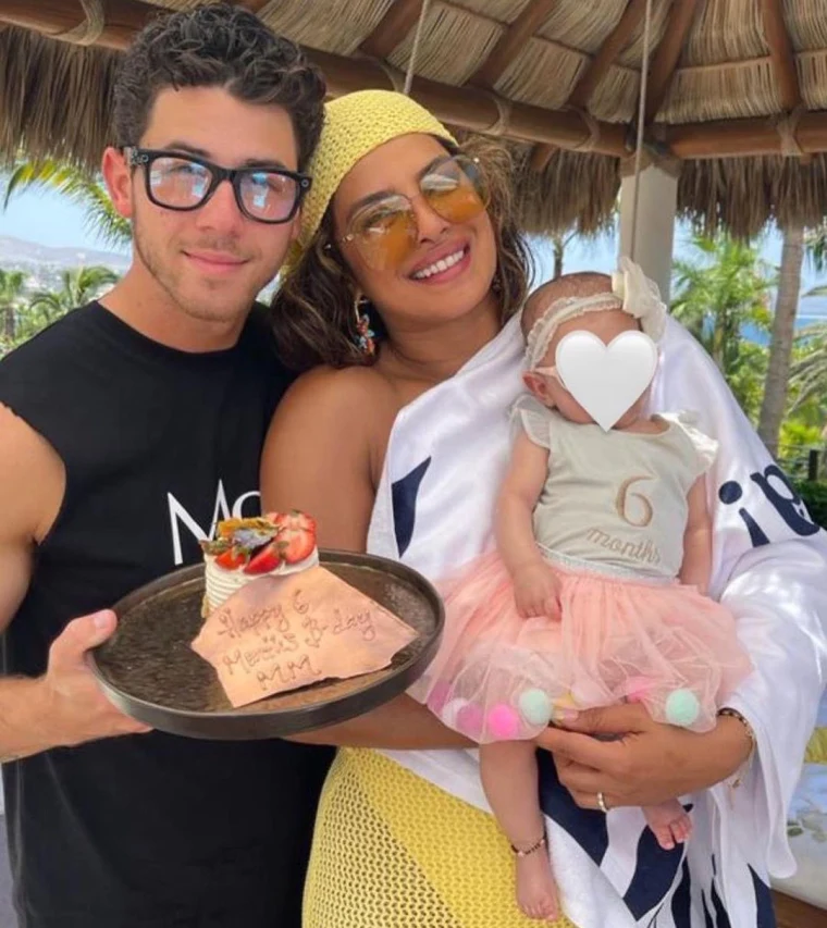 Nick Jonas and Priyanka Chopra with their Baby