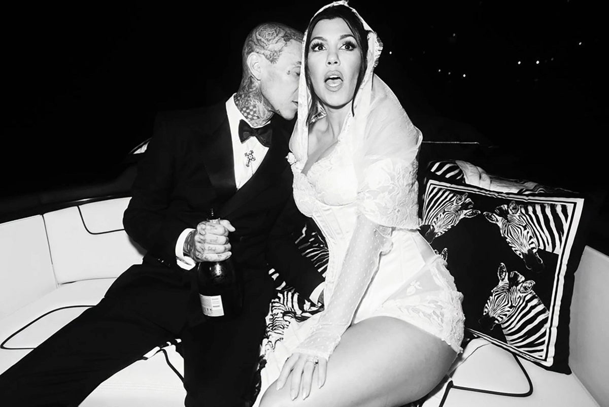 Kourtney Kardashian and Travis Barker as newly-weds