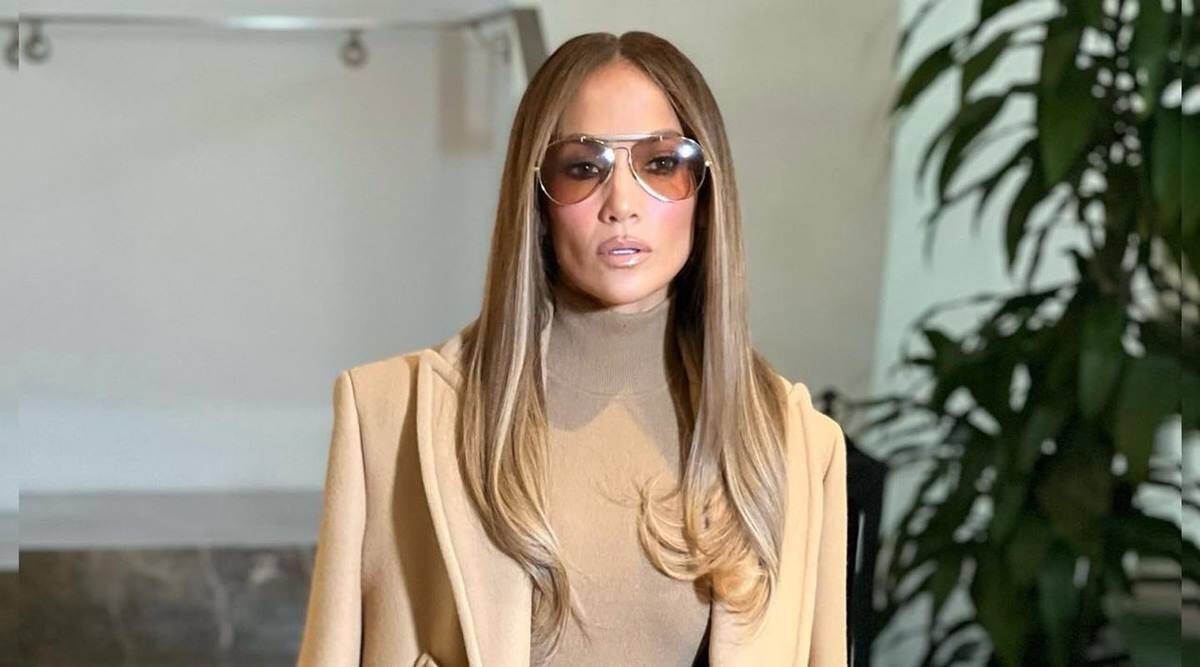Jennifer Lopez goes monotone in a tracksuit and crocodile Hermes