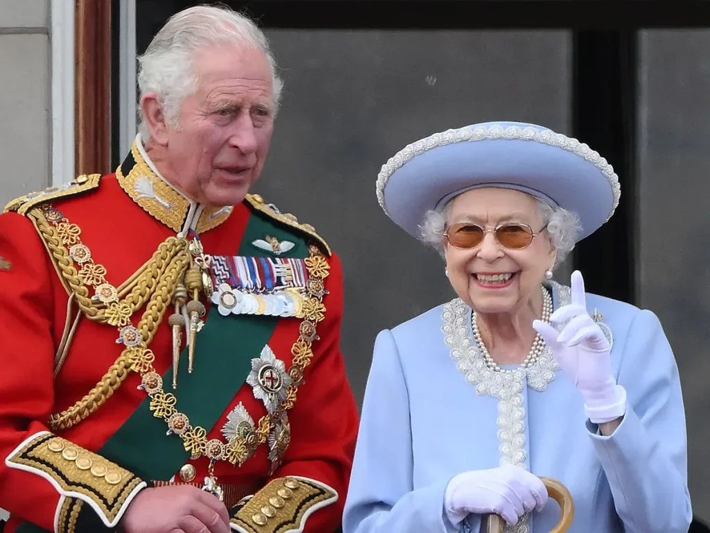 King Charles III and late Queen Elizabeth II