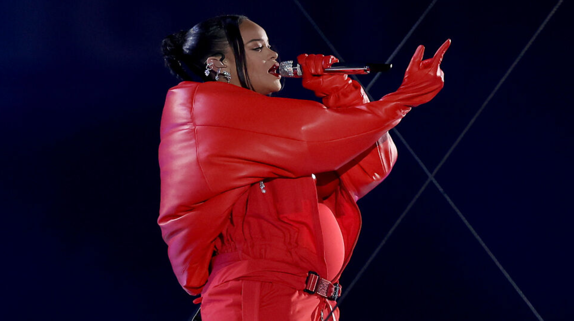 Rihanna reveals her 2nd baby bump at the Super Bowl Half time show