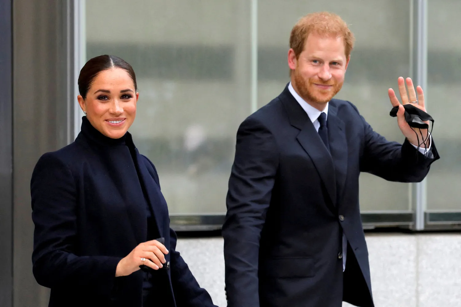 Prince Harry With his wife Meghan Markle against The publishers