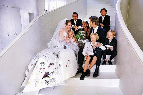 Brad Pitt and Angelina Jolie with their children at their wedding.