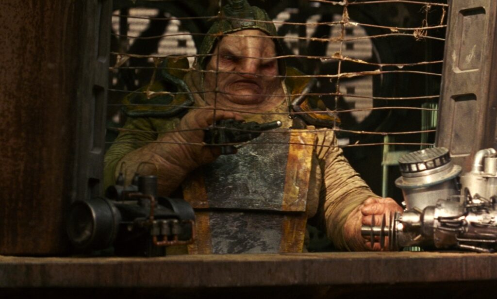 Simon Pegg as Unkar Plutt in Star Wars: The Force Awakens